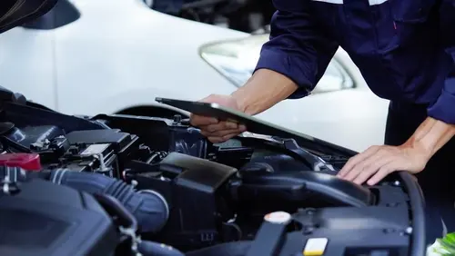Vehicle undergoing an official Texas state safety inspection