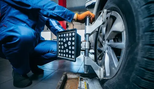 Precision wheel alignment adjustment using specialized alignment equipment
